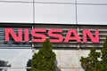Nissan logo on the facade of Nissan salon building