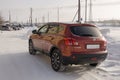 Nissan Qashqai in red color. This is crossover that combines modark design and compact hatchback refinement with functionality