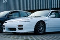 Nissan S13 200SX 240SX white parked on the street