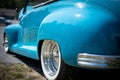 NISSWA, MN - 30 JUL 2022: Close view of back left vivid sky blue antique vintage convertible automobile with the top down at a c Royalty Free Stock Photo