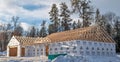 NISSWA, MN - 22 NOV 2021: Home construction site with new wood roof trusses