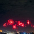 Night photo of New Year's arrival (RÃÂ©veillon) with fireworks in the sky Royalty Free Stock Photo