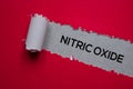 Nitric Oxide Text written in torn paper. Medical concept Royalty Free Stock Photo