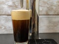 Nitro Cold Brew coffee in a clear glass