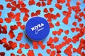 Nivea cream product and red hearts blue background Royalty Free Stock Photo