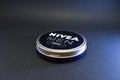 Nivea Men Creme classic round for face body and hands container on isolated black background