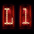 Nixie tube indicator set of letters the whole alphabet. The letter L Royalty Free Stock Photo