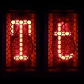 Nixie tube indicator set of letters the whole alphabet. The letter T Royalty Free Stock Photo