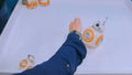 Woman controls BB-8 droid from StarWars with special bracelet