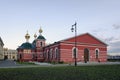 Former Military Riding House of the Carabineer Regiment and Nikolskaya church in the territory of Kremlin. Summer sunset view.