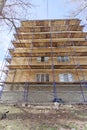 Nizhny Novgorod, Russia. - April 28.2018. Hasty repairs and painting of the facades of buildings near the football