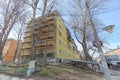 Nizhny Novgorod, Russia. - April 28.2018. Hasty repairs and painting of the facades of buildings near the football