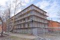 Nizhny Novgorod, Russia. - April 27.2018. Hasty repairs and painting of the facades of buildings near the football stadium on Sovn