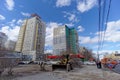 Nizhny Novgorod, Russia. - April 27.2018. Hasty repairs and painting of the facades of buildings near the football stadium on Sovn