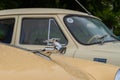 Figurine of deer on the hood of GAZ M21 Volga at Classic Soviet Car Exhibition