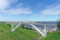 Nizhny Novgorod, Russia. - June 21.2018. Pedestrian bridge across the Sergievsky ravine on the background of the Arrow