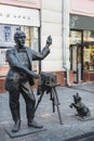 Nizhny Novgorod, Russia, May 29, 2023. Urban sculpture, monument to a photographer with a dog on Bolshaya Pokrovskaya
