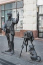 Nizhny Novgorod, Russia, May 29, 2023. Urban sculpture, monument to a photographer with a dog on Bolshaya Pokrovskaya