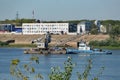 Nizhny Novgorod, Russia 08.07.2023 Oka River. Towing train on the river. A tug pulls a barge down the river. Caravan