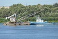 Nizhny Novgorod, Russia 08.07.2023 Oka River. Towing train on the river. A tug pulls a barge down the river. Caravan