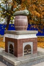 Nizhyn, Ukraine - October 17, 2021: Monument to Nizhyn Cucumber. Giant pickle of green italian granite on top of brown barrel