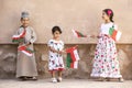 Omani kids with flags celebrating national day