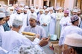NIZWA, OMAN - NOVEMBER 18, 2022: Nizwa Goat Market. Traditional natural honey auction at Nizwa, Oman.