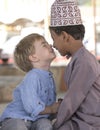 Omani boy making frineds with european boy