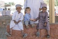 Omani boy making friends with european boy
