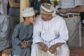 Omani people at a traditional goat market Royalty Free Stock Photo