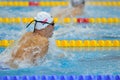 Nknown swimmer competing in Dinamo pool in Romanian International Championship Swimming Royalty Free Stock Photo