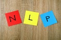 NLP - Neuro Linguistic Programming sign on sticky notes