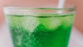 Nmacro photo of a soda with ice cubes in a glass close-up Royalty Free Stock Photo