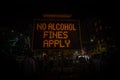 No alcohol fines apply sign prohibiting alcohol consumption