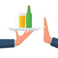 No alcohol. Man offers to drink holding bottle of beer and a glass on a tray. Royalty Free Stock Photo