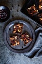 Chocolate puffed quinoa bars with freeze dried black currant, candied papaya, cashew nuts, almonds and cranberries Royalty Free Stock Photo