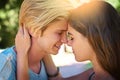 No better feeling than that loving feeling. an affectionate young couple sharing a tender moment outdoors. Royalty Free Stock Photo