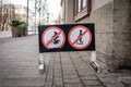 No Bicycles and No Scooters Traffic Sign on Urban Sidewalk Royalty Free Stock Photo