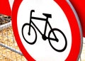 No bikes allowed, round red warning biking prohibition sign, simple symbol object detail, closeup, nobody. No bicycles, bikers