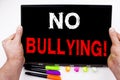 No Bullying text written on tablet, computer in the office with marker, pen, stationery. Business concept for Bullies Prevention A