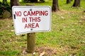 No camping in this area sign on a green grass Royalty Free Stock Photo