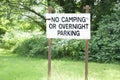 No camping or overnight parking allowed sign in public park