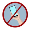 No cell phones allowed, hand with smartphone Royalty Free Stock Photo