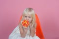 No child can resist these exciting yummy treats. Small girl hold lollipop on stick. Small child with sweet lollipop Royalty Free Stock Photo