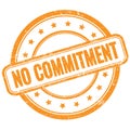 NO COMMITMENT text on orange grungy round rubber stamp