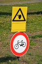 No cycling traffic sign on the grass area