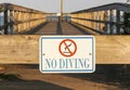 No Diving Sign on a pier Royalty Free Stock Photo