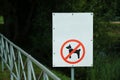 No dog walking sign, dogs are not allowed to walk in the park, prohibition sign for pets. Royalty Free Stock Photo