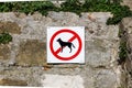 No dogs or pets allowed, warning sign at wall Royalty Free Stock Photo