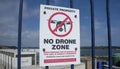 No drone zone sign on railings